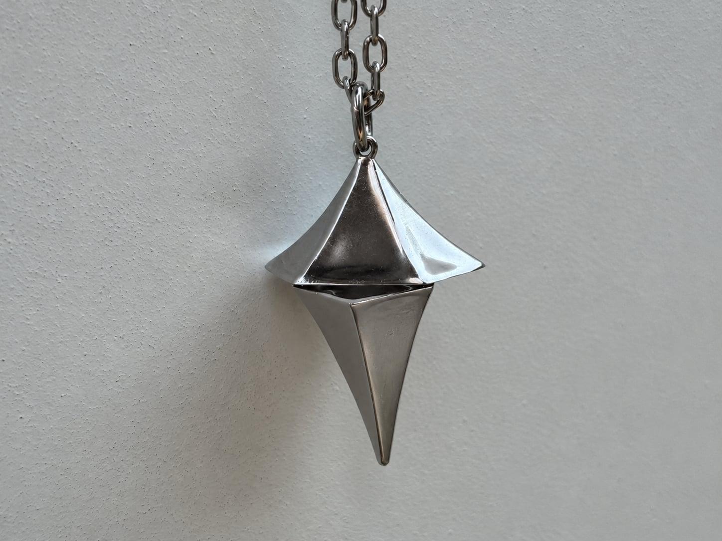 Photo-based detail of the rotated Glimmer prototype with neutralized metal reflections