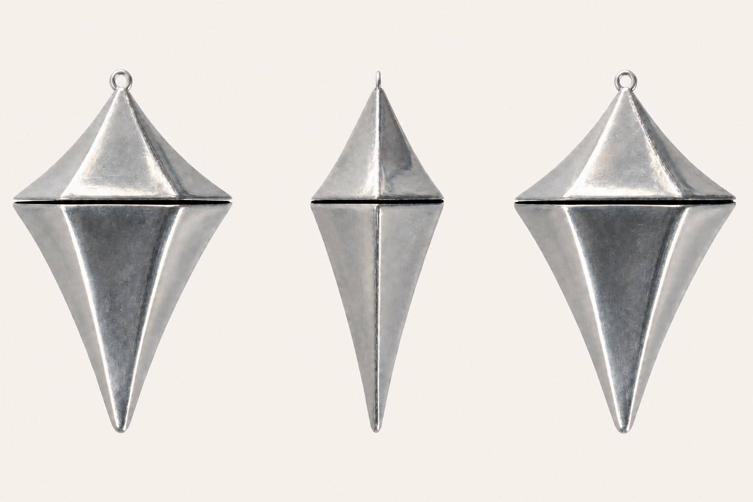 STEP-informed form study showing front, profile, and back views of the polished silver Glimmer pendant